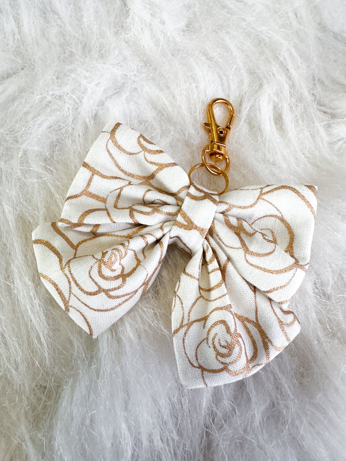 Gold rose bag charms