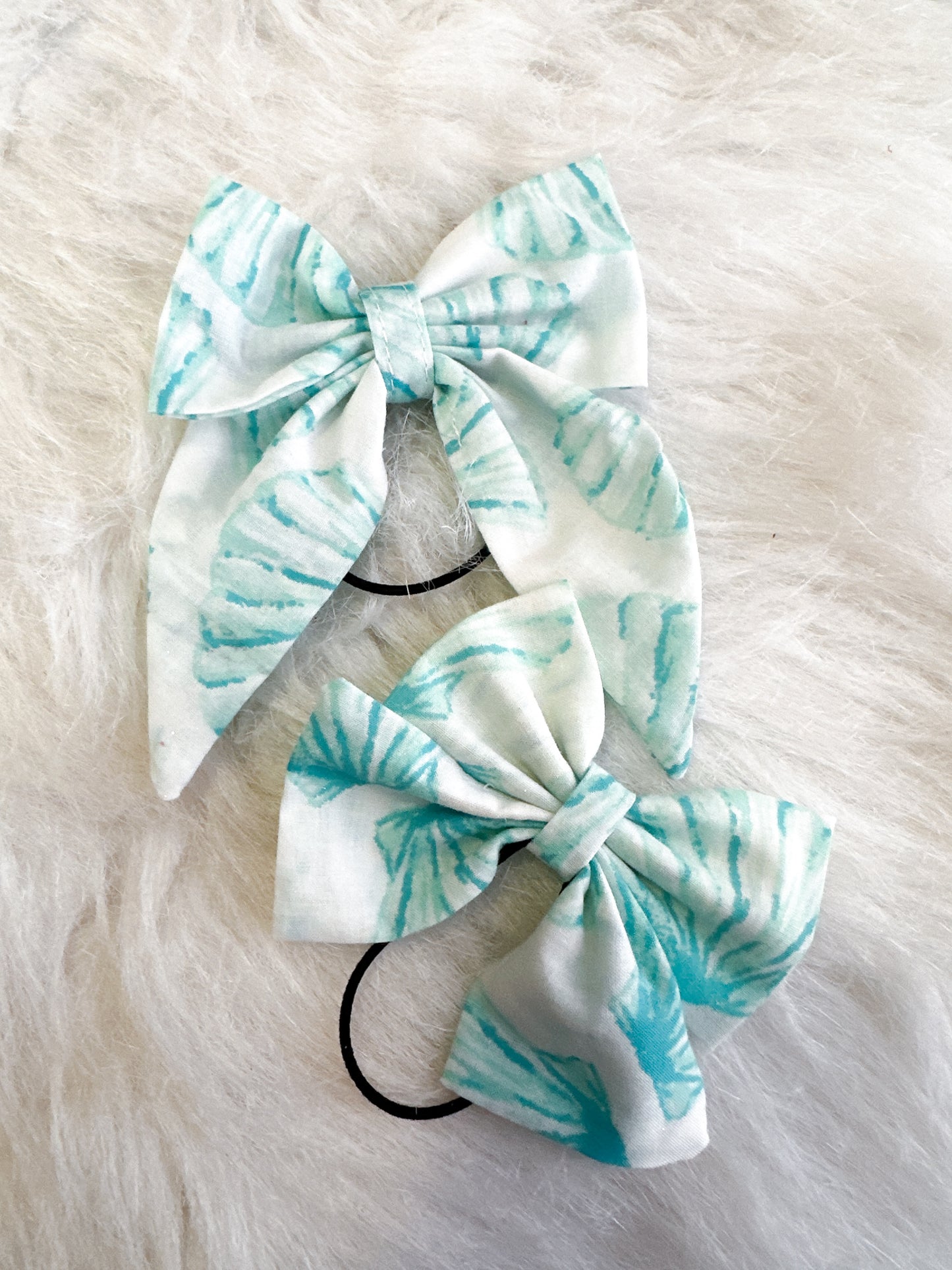 Blue shell cotton bows