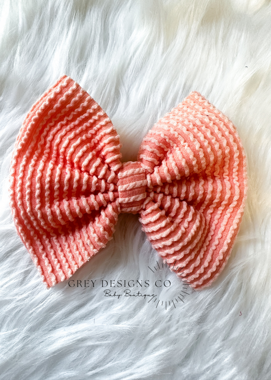 Peach fuzz bows