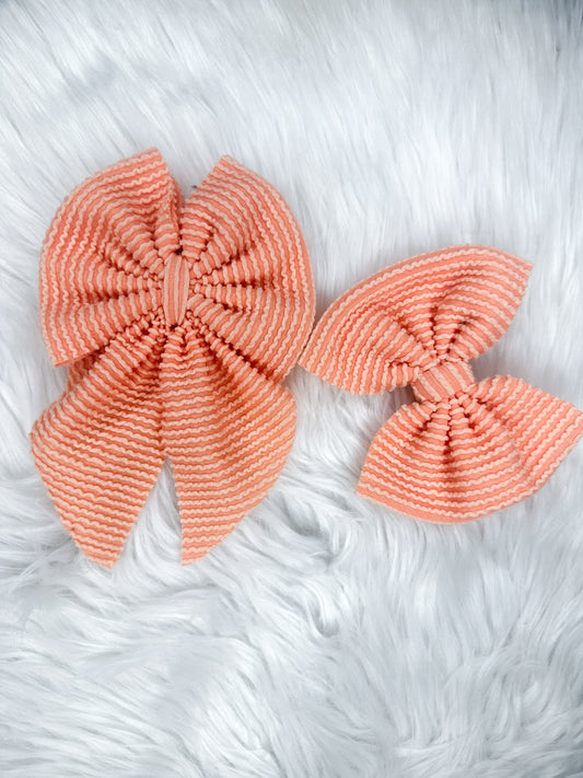Peach fuzz bows